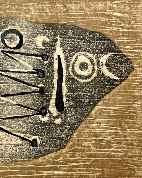 Limited edition 1974 Japanese woodblock print by Hideo Hagiwara depicting an abstract fish in black, white, and ochre with expressive woodgrain texture.