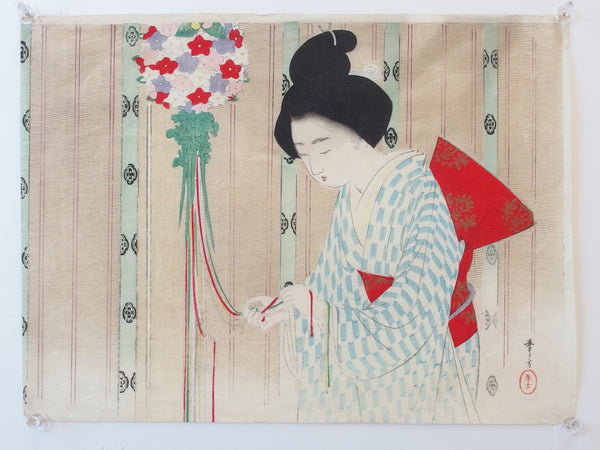 Geisha with New Years flowers