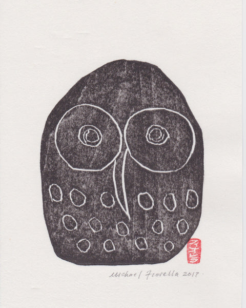 Black and white abstract handmade woodblock print on a white background