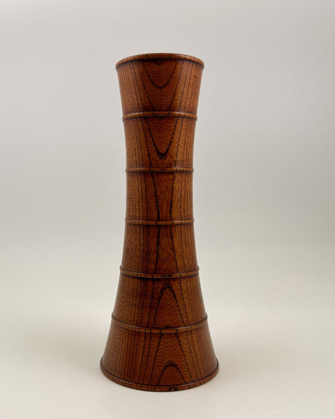 Signed vintage Japanese turned keyaki wood ikebana vase with warm natural grain and bamboo-inspired sculptural form.