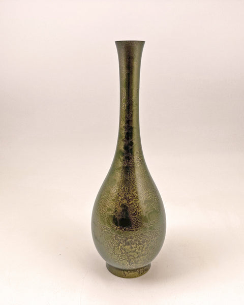Vintage Japanese patinated metal ikebana vase with elongated neck and bronze-toned sculptural finish.