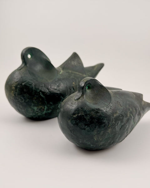 Pair of vintage Japanese stylized dove sculptures in bronze-green patinated cast metal, mid-century modern design.
